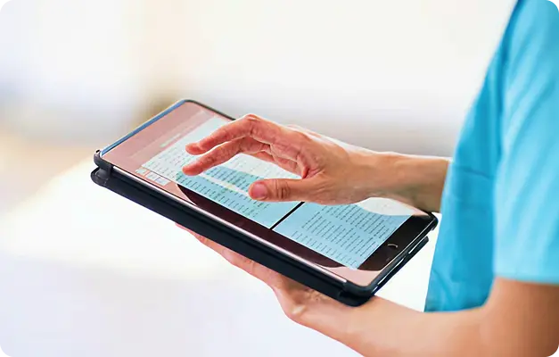 Doctor using app on tablet