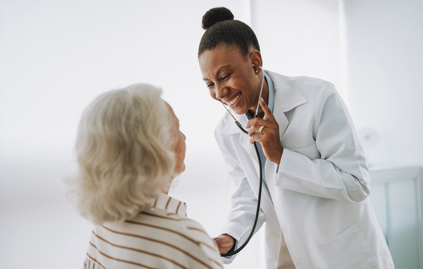 Physician listening to a patient's heartbeat