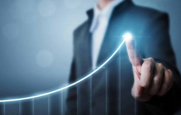 Professional touching a digital bar graph overlay with a finger