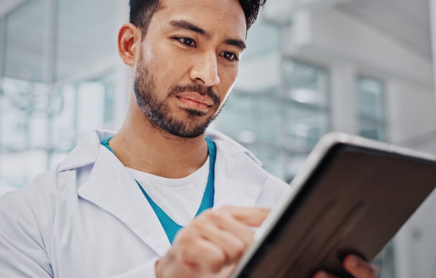 Medical professional uses tablet