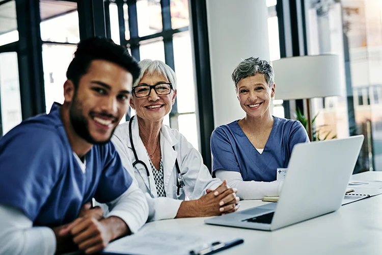 Confident medical professional setting up a new healthcare practice using digital tools and support resources
