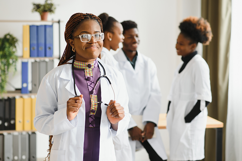 doctor in glasses smiling