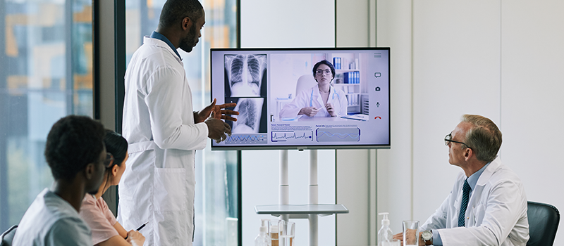 medical team around monitor